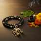 7mm Silver Capped Karungali Mala with Brass Nandi Pendant in a serene Shiva devotional setting