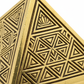 Siddh Lakshmi Yantra Pyramid macro close-up of sacred geometry engraving on white background