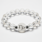Capricorn Bracelet close-up of zodiac crystal beads on white background