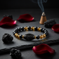 Metal Dhan Yog Bracelet Black on dark slate with protective grounding energy in a serene spiritual setting