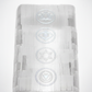 7 Chakra Selenite Plate macro close-up showing engraved chakra symbols and natural fibrous white selenite texture