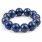 Lapis lazuli anklet macro detail showing deep royal-blue colour and golden pyrite flecks on individual beads
