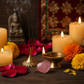 Rose Quartz Heart Pendant in a spiritual Indian setting with diya, rose petals and marigold flowers