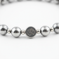 Karz Mukti Bracelet Silver Hematite close-up of mirror-like silver hematite beads